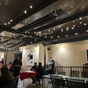 a group of people sitting at tables