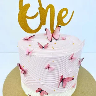 a cake with a one on top