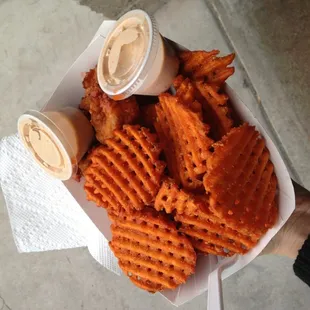 Fried shrimp plate with sweet potato fries.