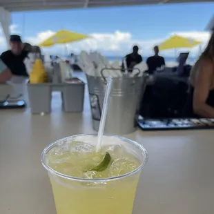 Patron margarita with a beautiful beach view