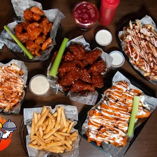 a variety of wings and fries