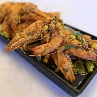 Volcano Shrimp: 1 lb Shrimp w/ corn, ginger, scallion, house cream sauce | $24.99 (Must order if you like salted egg yolk shrimp!)