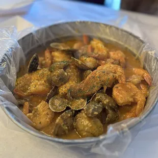 1 lb headless shrimp, 1 lb clam, sausage, corn in mild super ultimate sauce