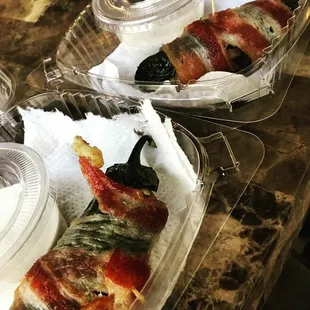 Jalapenos stuffed with cheese and buttery shrimp,  wrapped with smoked bacon.    3 for $5.00 7 for $10.00
