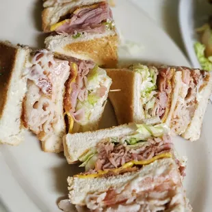 a plate of sandwiches