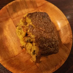 Half of a piece of crawfish jalapeño cornbread