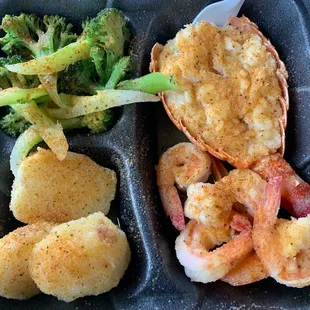 Steamed lobster and shrimp with potatoes and broccoli  I wish I have gotten more shrimp it was good