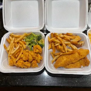 Fried shrimp with fried and broccoli. Catfish and fries