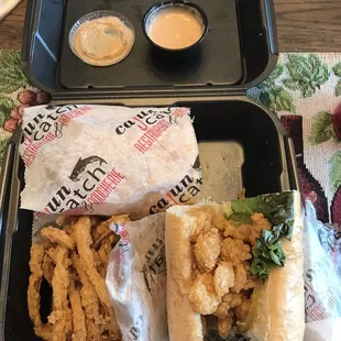 Shrimp poboy. Tasty and HUGE!!  The onion rings were great too!