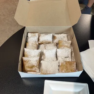 a box of powdered sugar squares