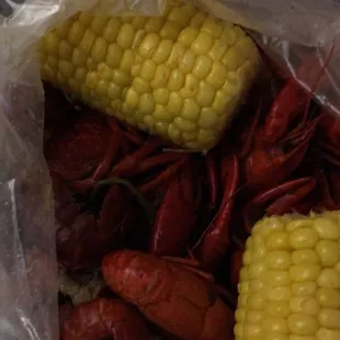 4 lbs of crawfish and an order of corn.
