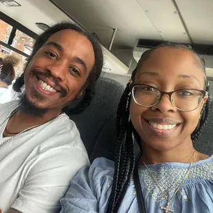 a man and a woman on a bus