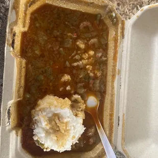 Cold etouffee with clumpy rice.