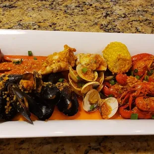 New addition to the menu, sampler platters, snow crab, mussels, clams, and fresh CRAWFISH