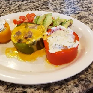 New addition to the menu, steamed bell peppers stuffed with,1 grilled chicken,1grown beef,1shrimp, homemade cream sauce and queso dip