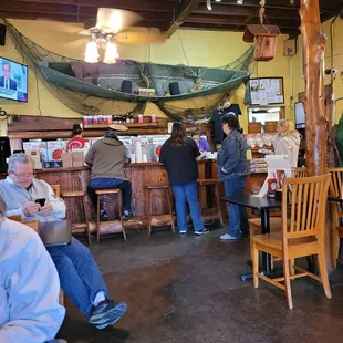 a group of people sitting at tables