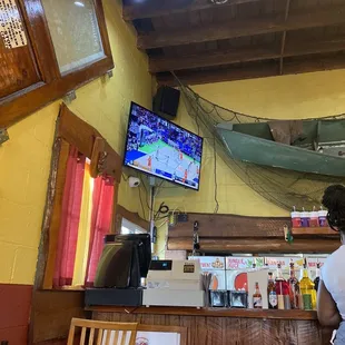 a woman sitting at the bar