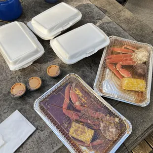 a variety of food items on a picnic table