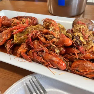a plate of cooked crawfishs