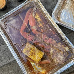 a lobster and corn on the cob