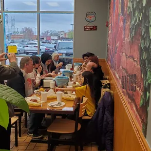 people eating and drinking