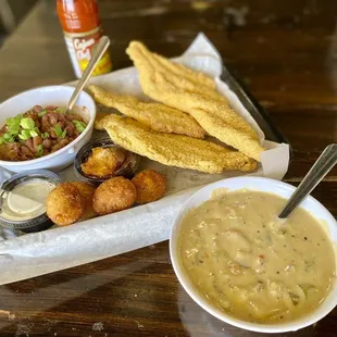 Fried catfish basket with a bowl of Cajun crawfish chowder