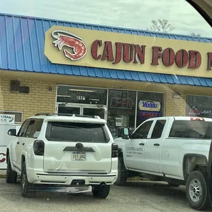 cars parked in front of the store