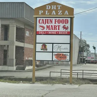 a sign for cajun food mart