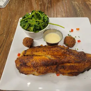 Blackened Catfish with sautéed spinach