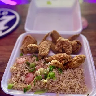 Eight piece chicken wing with shrimp fried rice. Delicious.