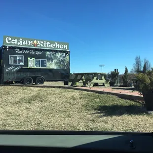 a food truck parked on the side of the road