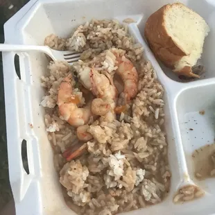 shrimp and rice in a styrofoam container