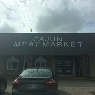 a car parked in front of the building