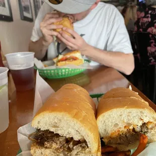 a man eating a sandwich