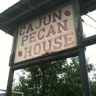 a sign for cajun pecan house