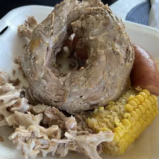 Turkey neck and remnants of a turkey neck lol, corn and sausage