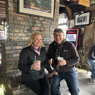 Enjoying the fire at Lafitte's Blacksmith Shop