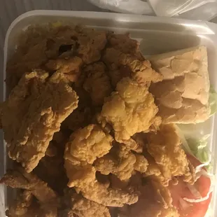 House special seafood platter. Shrimp , catfish, soft shell crab with side salad. Yummy and plentiful ! Shrimps are huge