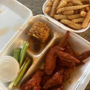 Fries and 6-Piece Buffalo Wings comes with ranch, celery, and corn.