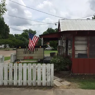 american flag on porch