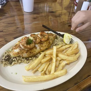 Grilled shrimp, fish with dirty rice