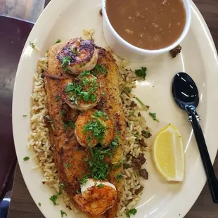 Grilled seafood on dirty rice