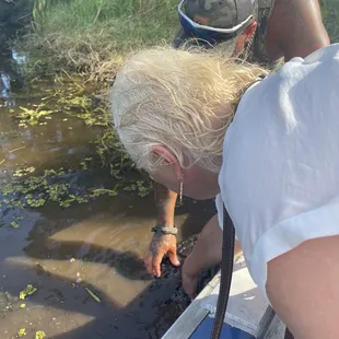 My mom touching Big Head.