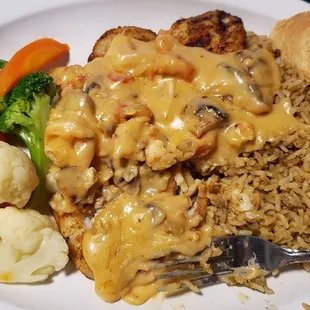 Blackened Tilapia/ Crawfish &amp; mushroom sauce and veggies.