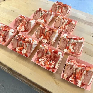 Yummy strawberry cake centered with creamy cheesecake