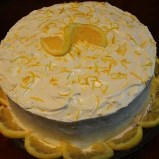 Blissful Sunshine is a delicious lemon cake with Lemon curd filling and Lemon Frosting.