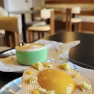 Passionfruit Mousse Cake (front), Pistachio Mousse Cake (back)