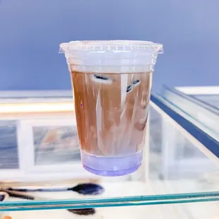 a plastic cup of iced coffee