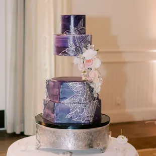 a three tiered cake on a table