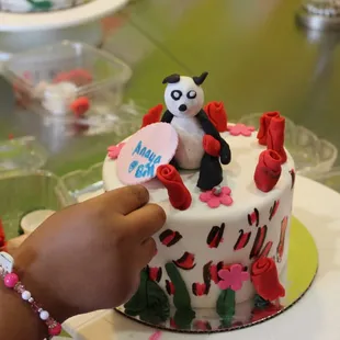 FINISHING TOUCHES AT THE PANDA PARTY